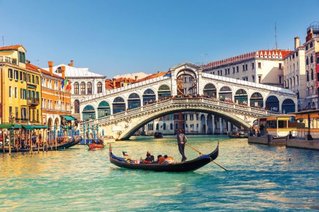 Rialto Bridge in Venice Gondola near Rialto Bridge in Venice, Italy